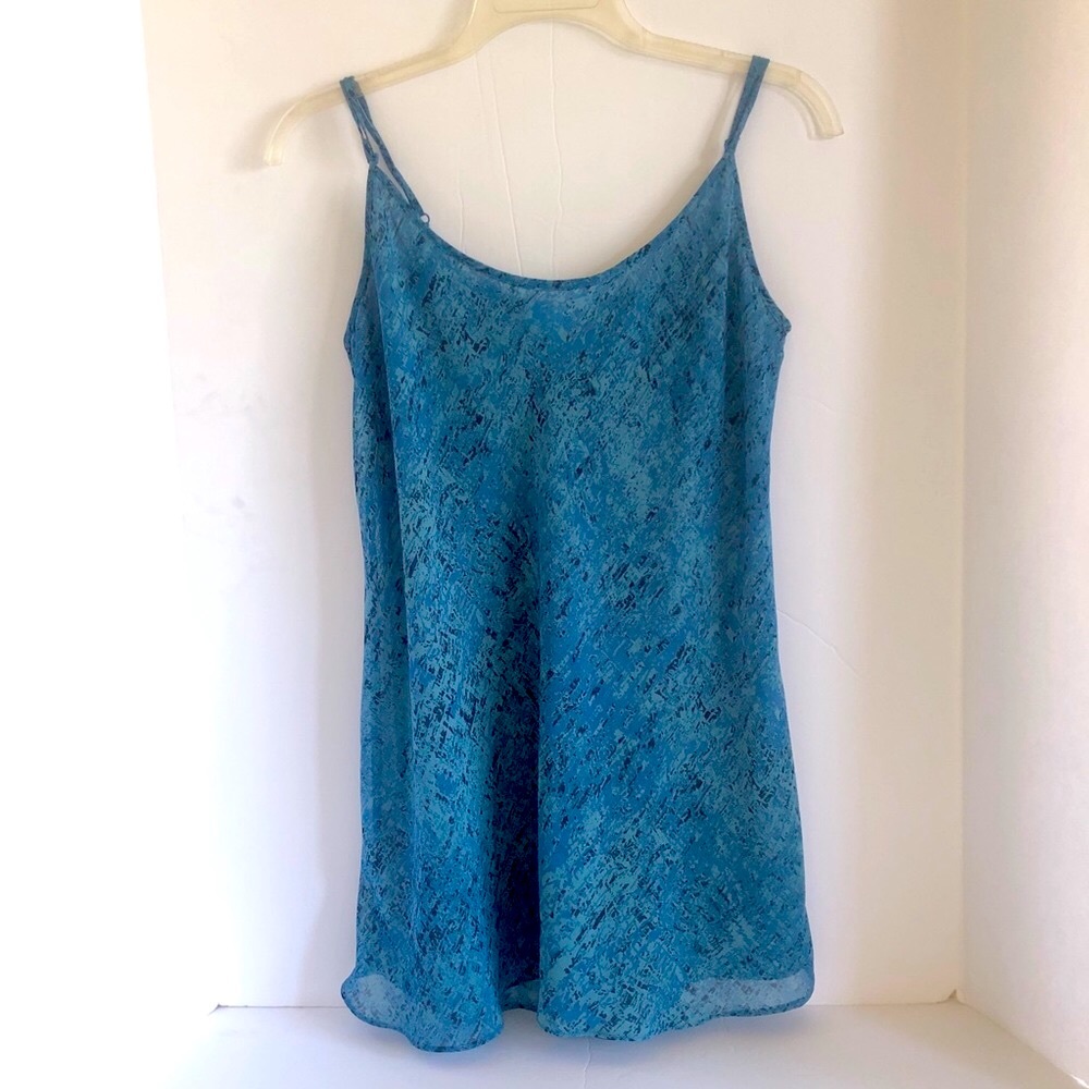 Cabi loose tank top blue size M with adjustable straps & lined.